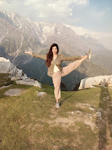 Varuna doing yoga in the mountains